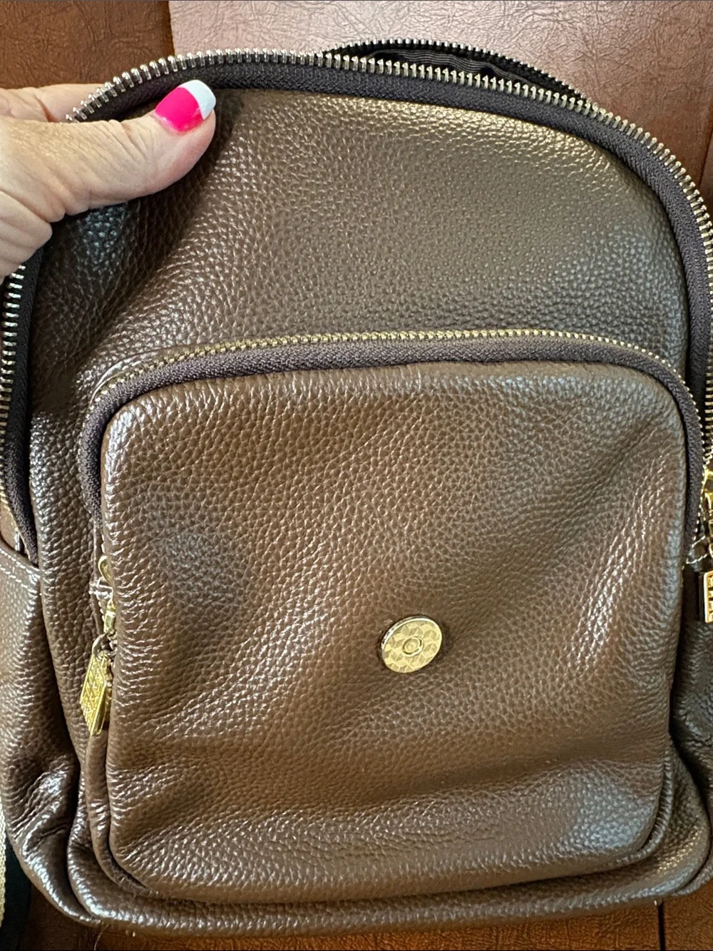 Unfamiliar￼ compact brown